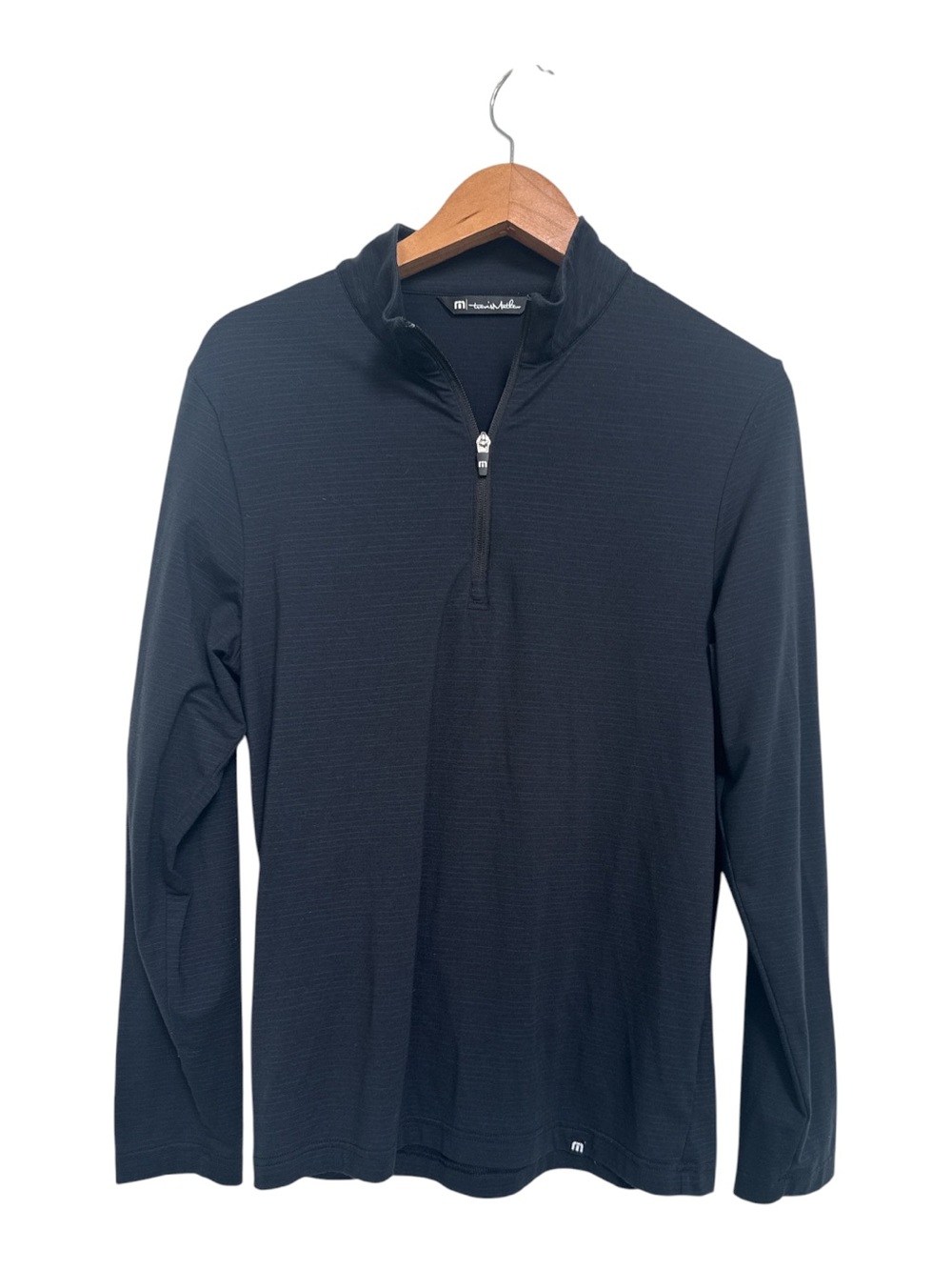 Travis Mathew’s Men’s Black Quarter-Zip Golf Pullover Shirt